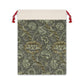 A rectangular Christmas-themed linen drawstring bag with a floral pattern, primarily in gray tones, and a red drawstring at the top.