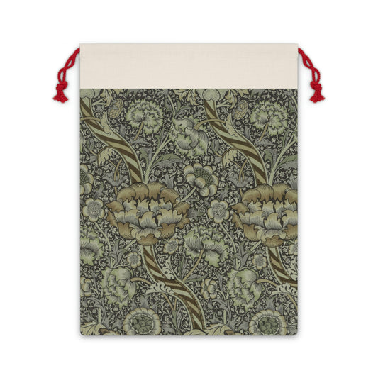 A rectangular Christmas-themed linen drawstring bag with a floral pattern, primarily in gray tones, and a red drawstring at the top.