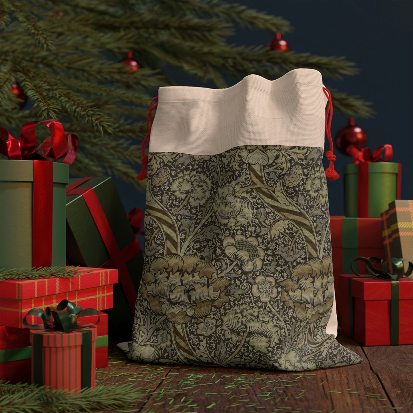 A rectangular Christmas-themed linen drawstring bag with a floral pattern, primarily in gray tones, and a red drawstring at the top.