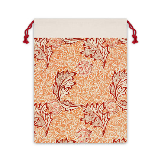 A rectangular Christmas-themed linen drawstring bag with a floral pattern, primarily in red and orange colours, and a red drawstring at the top.