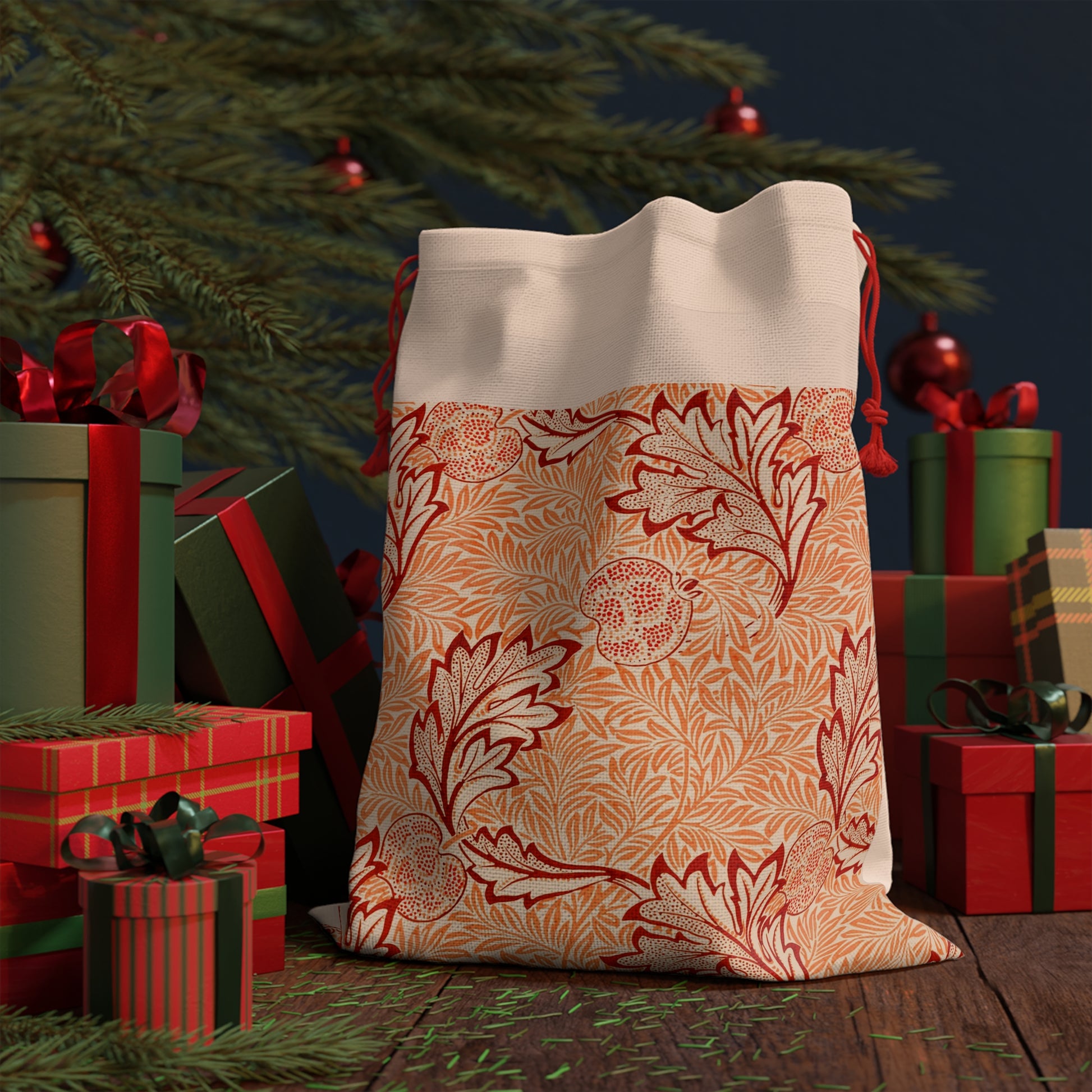 A rectangular Christmas-themed linen drawstring bag with a floral pattern, primarily in red and orange colours, and a red drawstring at the top.