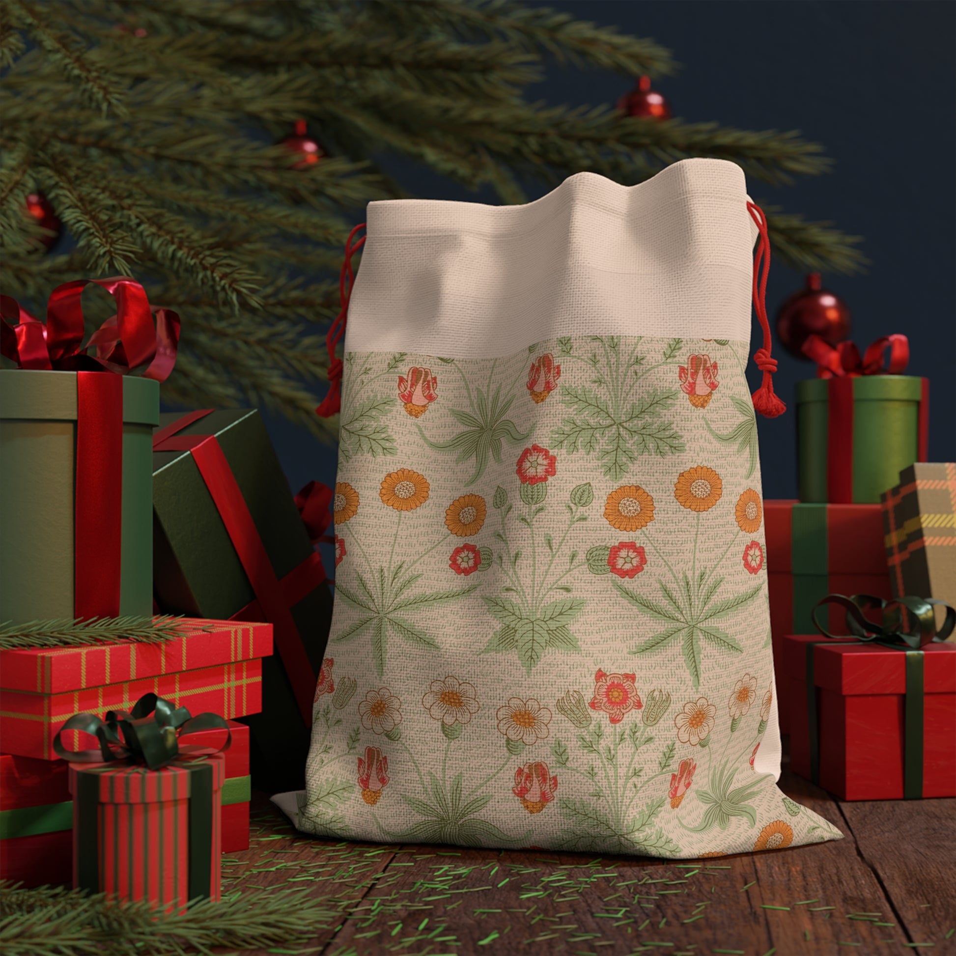 A William Morris inspired Christmas linen drawstring bag with a floral pattern in beige, green, and red hues.