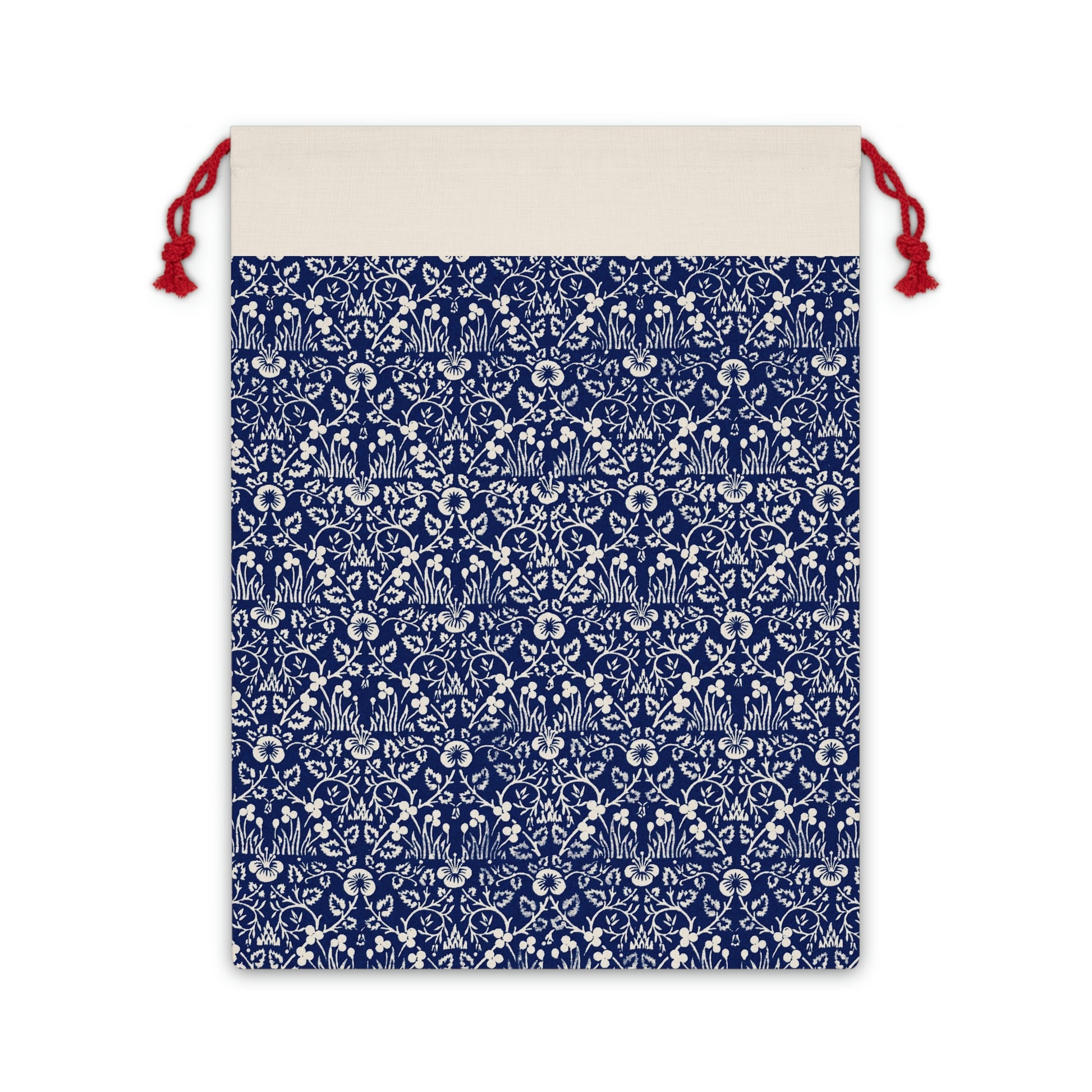 A beige linen drawstring gift bag with a blue floral pattern inspired by William Morris designs.