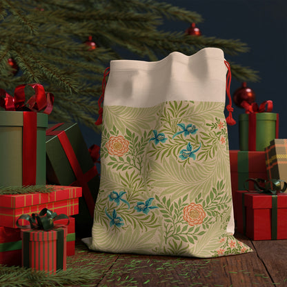 A beige linen drawstring bag with a floral pattern inspired by William Morris - Larkspur Collection.
