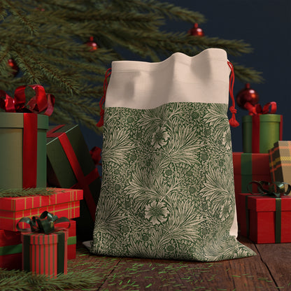 A rectangular Christmas-themed linen drawstring bag with a floral pattern in green, beige, and red colours, featuring a red drawstring at the top.