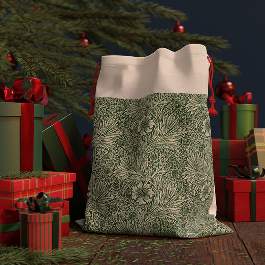 A rectangular Christmas-themed linen drawstring bag with a floral pattern in green, beige, and red colours, featuring a red drawstring at the top.