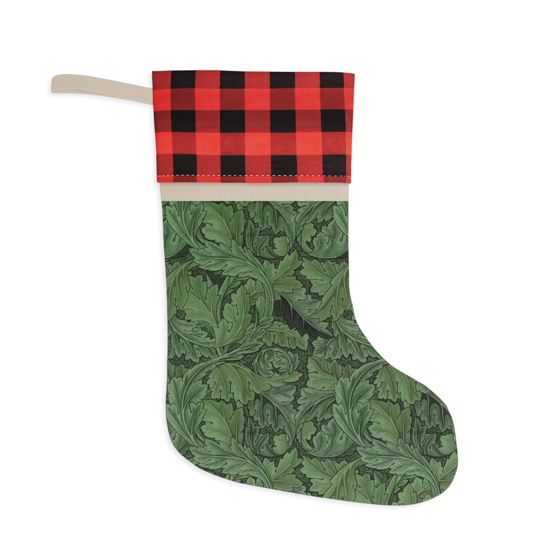 A green Christmas stocking with a black and white checkered top cuff and a wooden hanging loop in a William Morris & Co pattern.