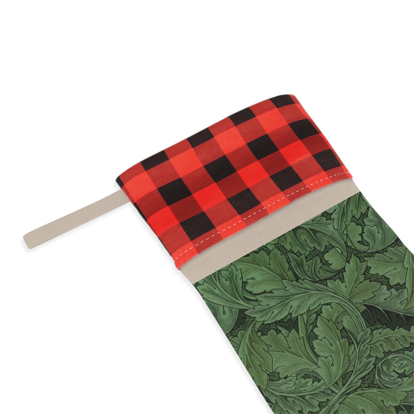 A green Christmas stocking with a black and white checkered top cuff and a wooden hanging loop in a William Morris & Co pattern.