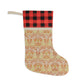 A one-sided print Christmas stocking with a red and black plaid design and a William Morris & Co floral pattern in orange and green tones. It has a beige background and a polyester cuff.