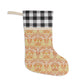 A one-sided print Christmas stocking with a red and black plaid design and a William Morris & Co floral pattern in orange and green tones. It has a beige background and a polyester cuff.
