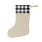 A one-sided print Christmas stocking with a red and black plaid design and a William Morris & Co floral pattern in orange and green tones. It has a beige background and a polyester cuff.