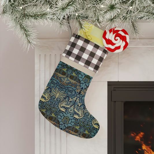 A one-sided printed Christmas stocking with a geometric and floral William Morris & Co pattern in multiple colours, featuring a black cuff at the top.