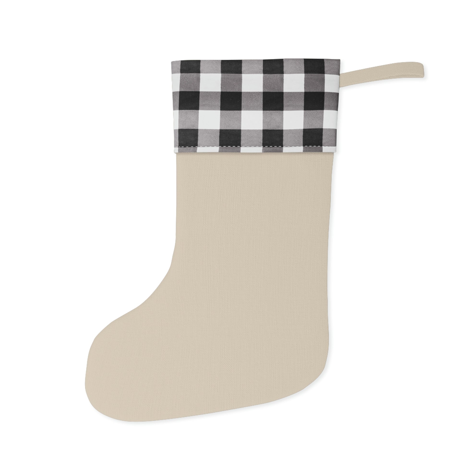A one-sided print Christmas stocking with a black and white plaid design at the top and a floral pattern in the middle section, and a beige bottom cuff in a William Morris & Co pattern..