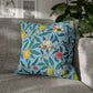 Cushion Cover in a floral pattern by William Morris & Co called Four Fruits Collection (Sky) in blue, green, red and yellow