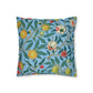 Cushion Cover in a floral pattern by William Morris & Co called Four Fruits Collection (Sky) in blue, green, red and yellow