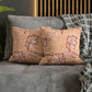 Square Cushion Cover  in a floral pattern by William Morris & Co called Apple Collection in orange, red and white