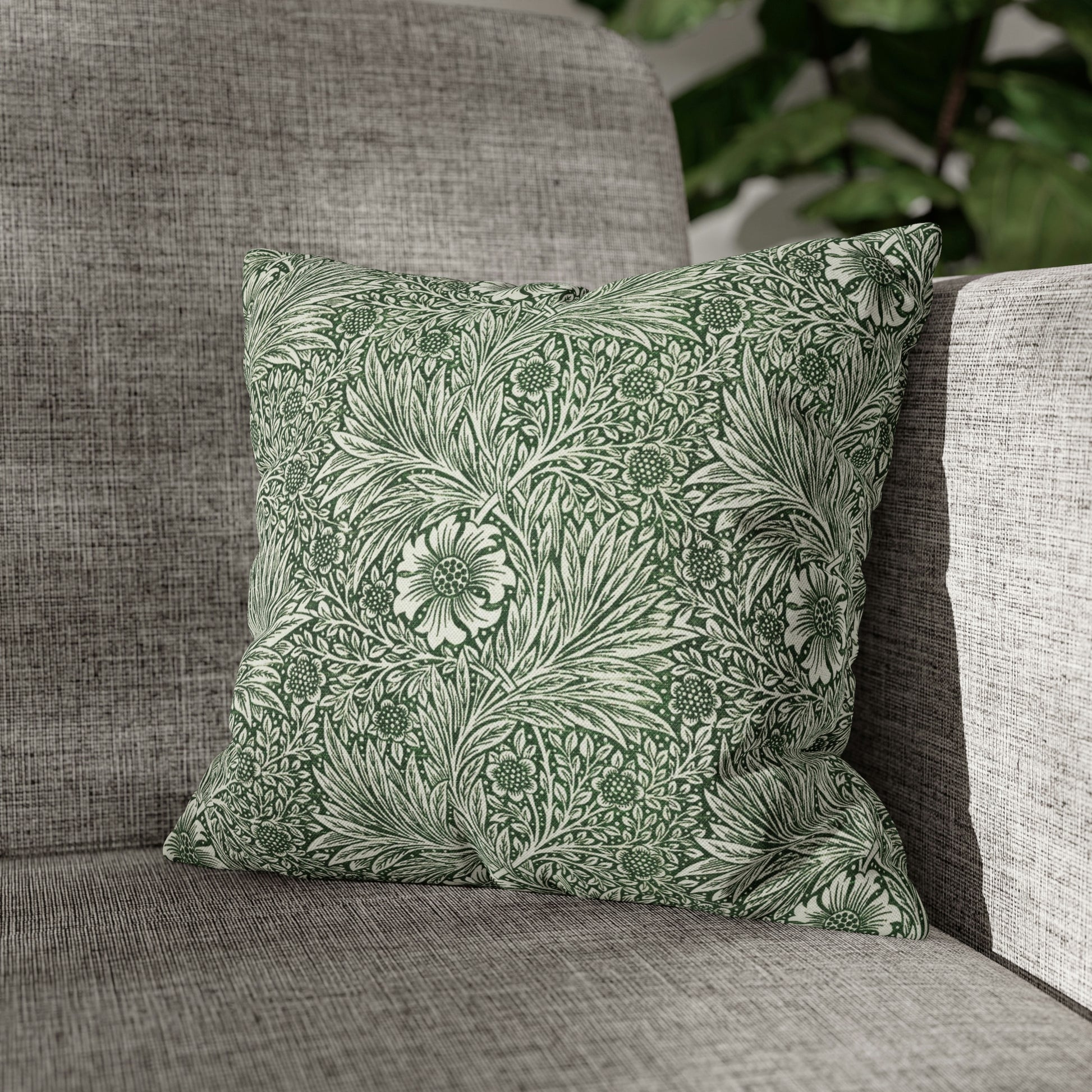 Cushion Cover in a green floral pattern created by William Morris  & Co called Marigold Collection
