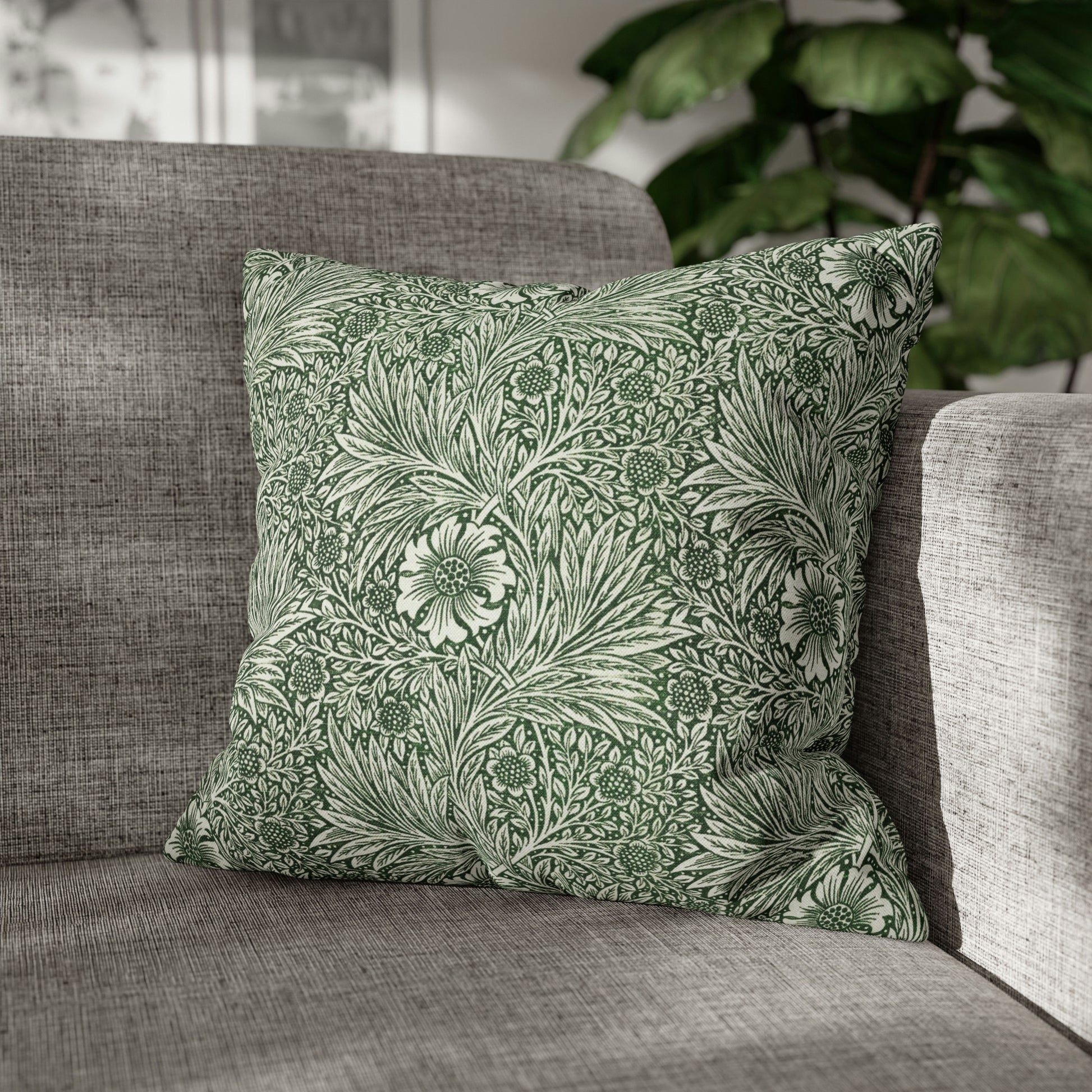 Cushion Cover in a green floral pattern created by William Morris  & Co called Marigold Collection