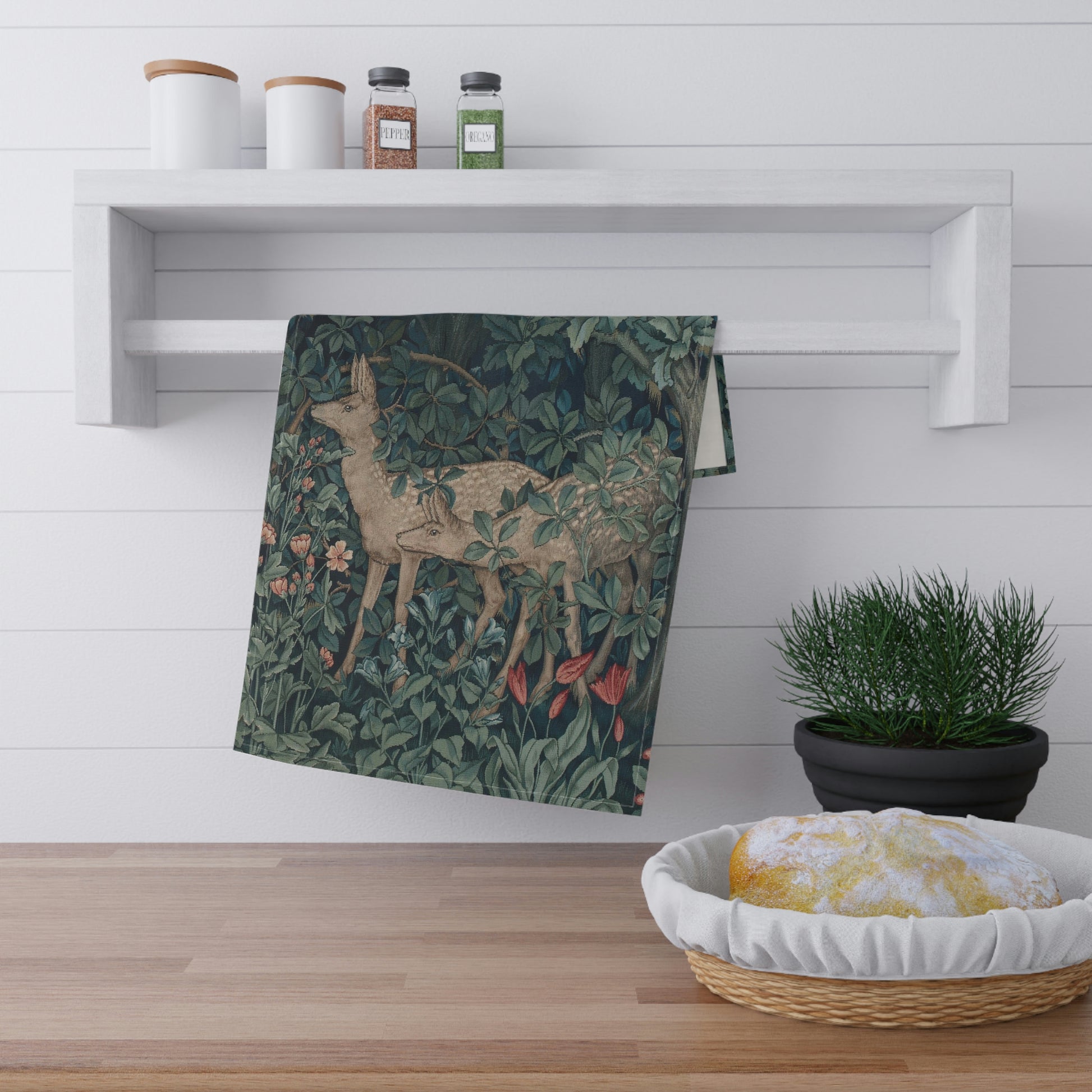 A kitchen tea towel featuring an artistic deer design with greenery and floral patterns inspired by William Morris - Greenery Collection.