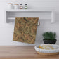 A kitchen tea towel with a floral and leaf pattern, inspired by William Morris - Acanthus Collection.