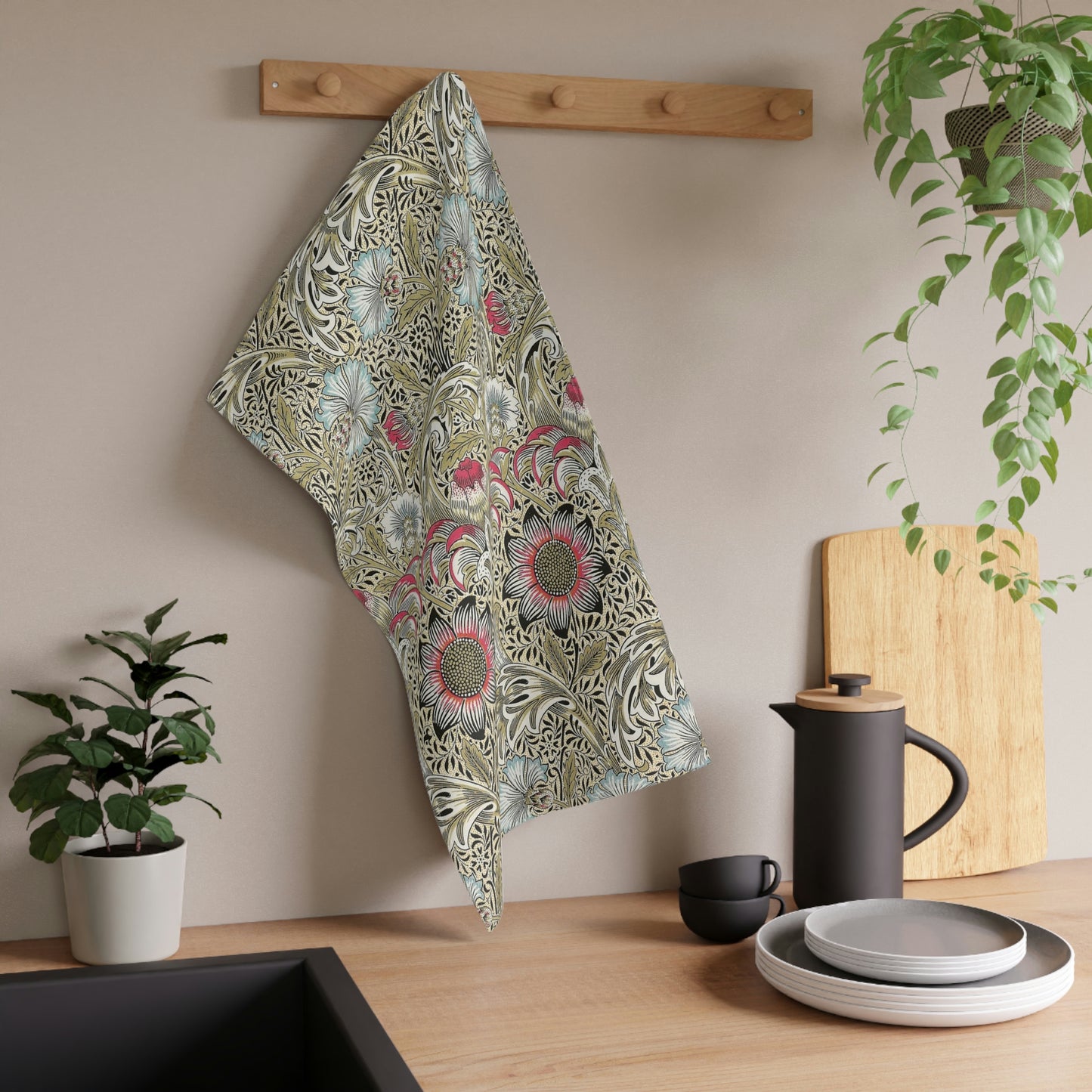 A kitchen tea towel with a floral pattern inspired by William Morris - Corncockle Collection.
