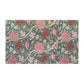 A kitchen tea towel with a floral pattern inspired by William Morris - Cray Collection, featuring predominantly blue, pink and red colours.
