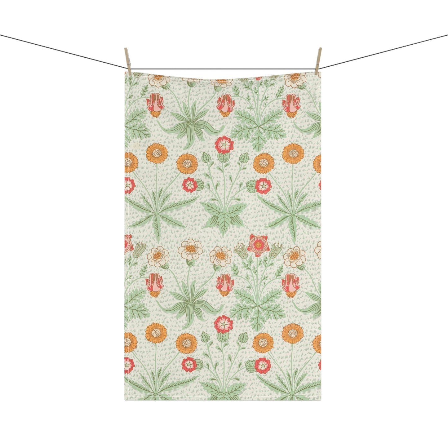 A kitchen tea towel featuring a floral William Morris & Co pattern with prominent orange and green colours on a white background.