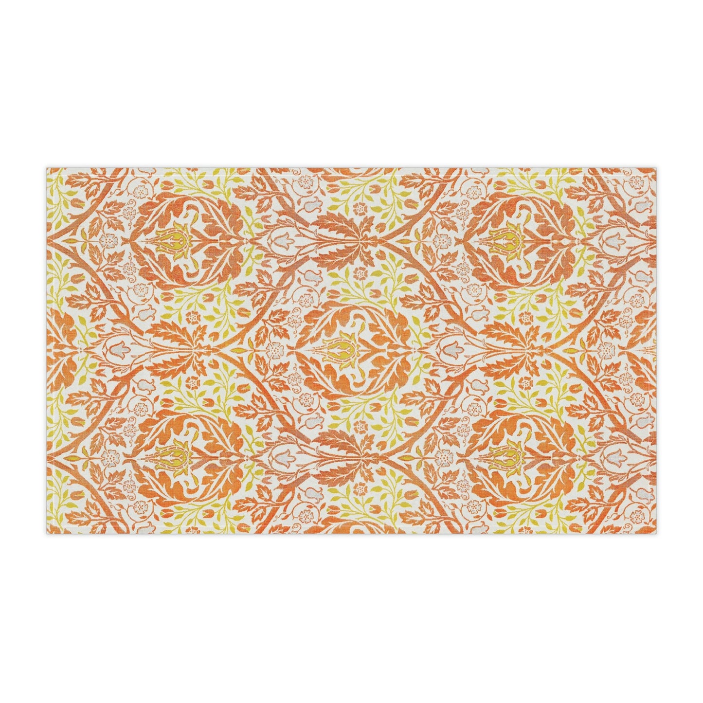 A kitchen tea towel with a floral William Morris  & Co pattern in orange, green, and yellow colours on a light background. 