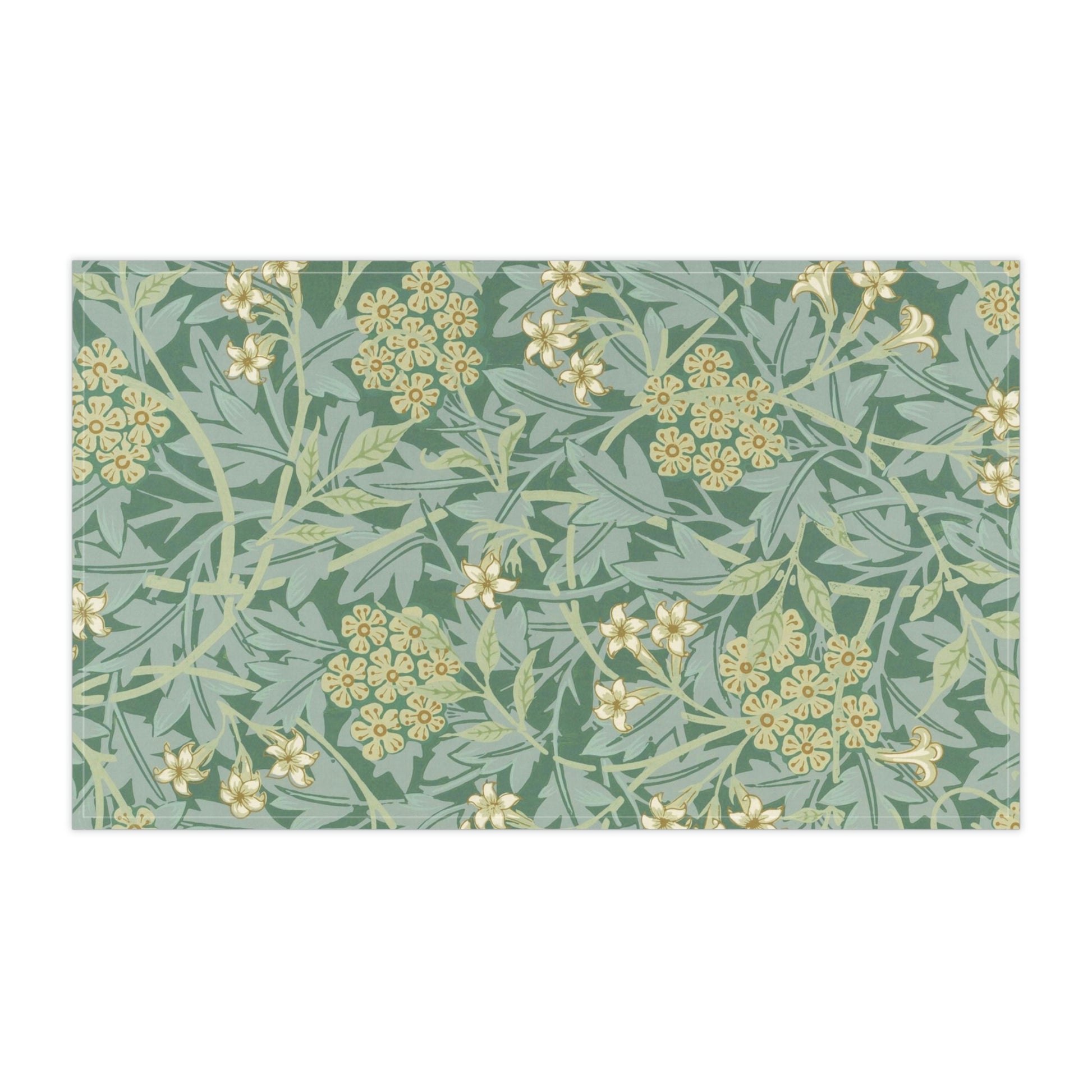 A kitchen tea towel with a green floral pattern inspired by William Morris & Co- Jasmine Collection.
