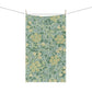 A kitchen tea towel with a green floral pattern inspired by William Morris & Co- Jasmine Collection.