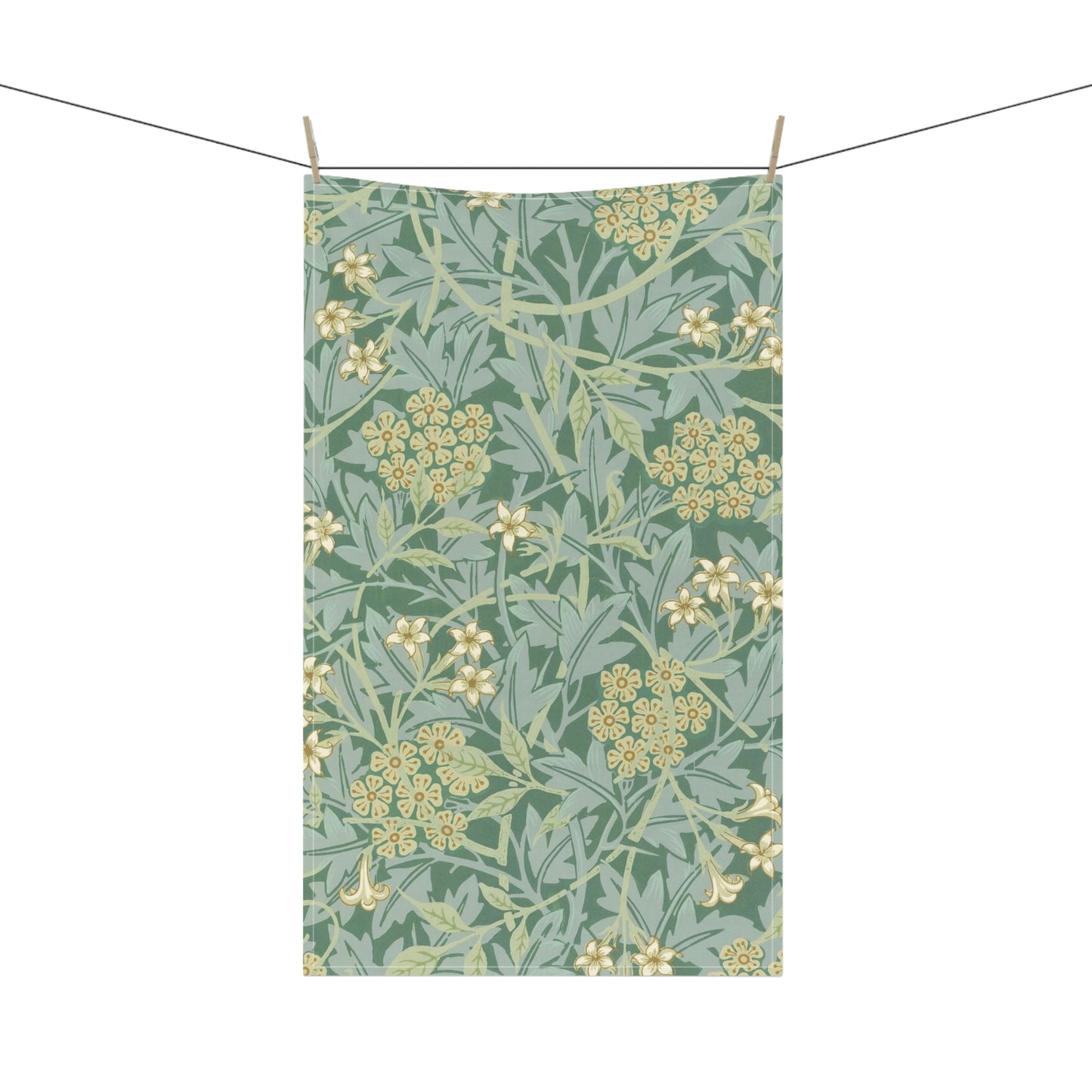 A kitchen tea towel with a green floral pattern inspired by William Morris & Co- Jasmine Collection.