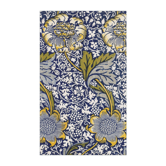 A kitchen tea towel with a floral pattern inspired by William Morris & Co - Kennet Collection.