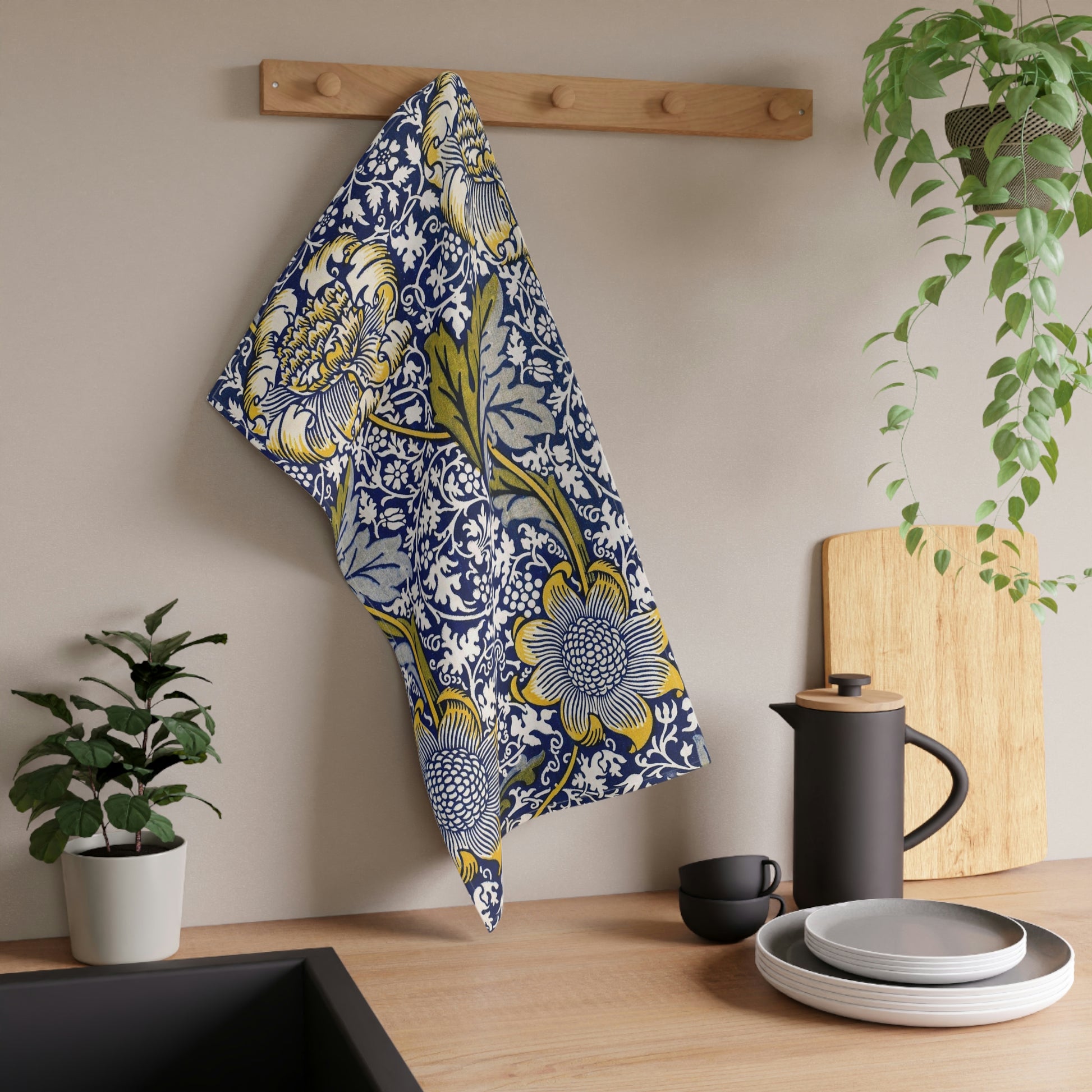 A kitchen tea towel with a floral pattern inspired by William Morris & Co - Kennet Collection.