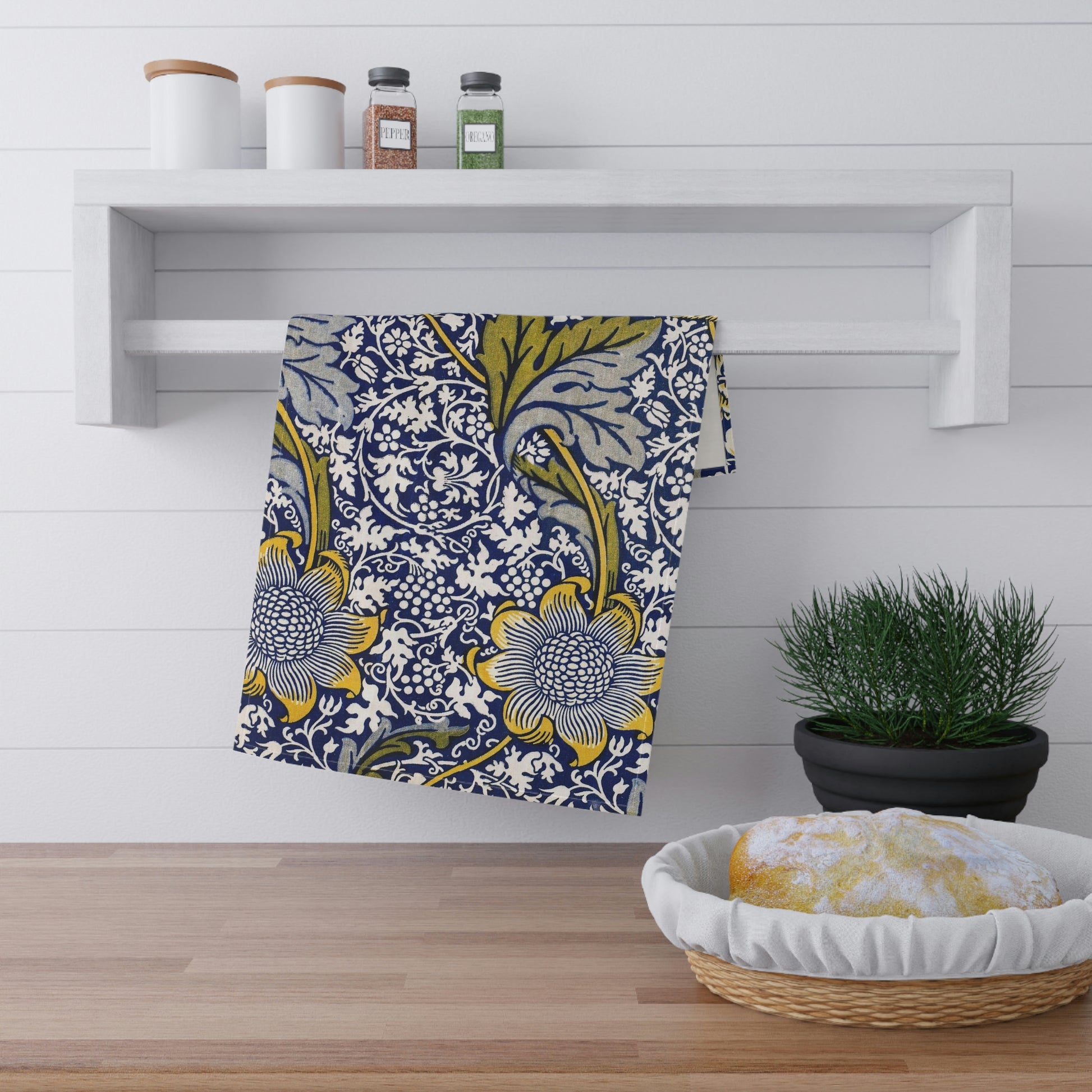 A kitchen tea towel with a floral pattern inspired by William Morris & Co - Kennet Collection.