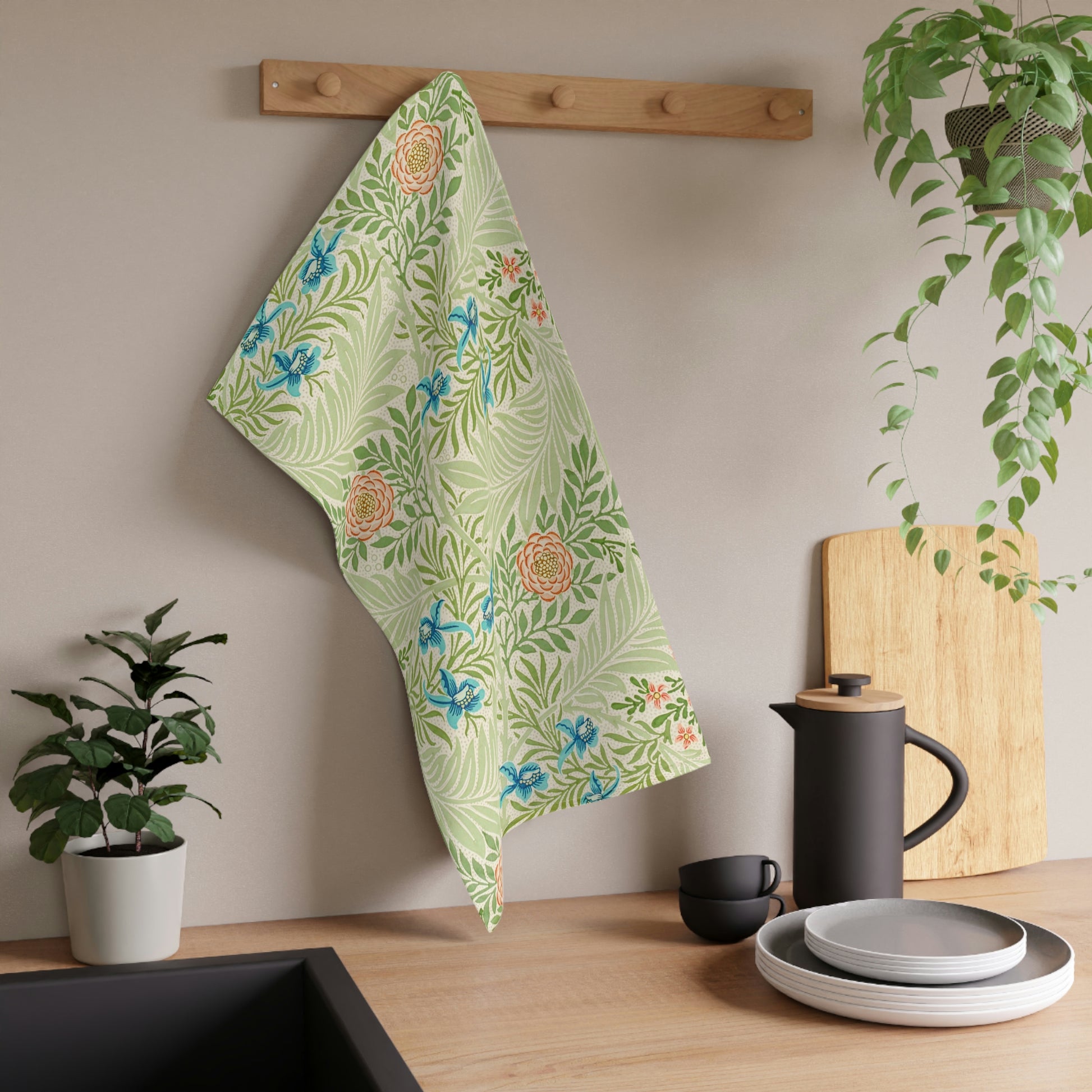 A kitchen tea towel with a floral pattern inspired by William Morris - Larkspur Collection.