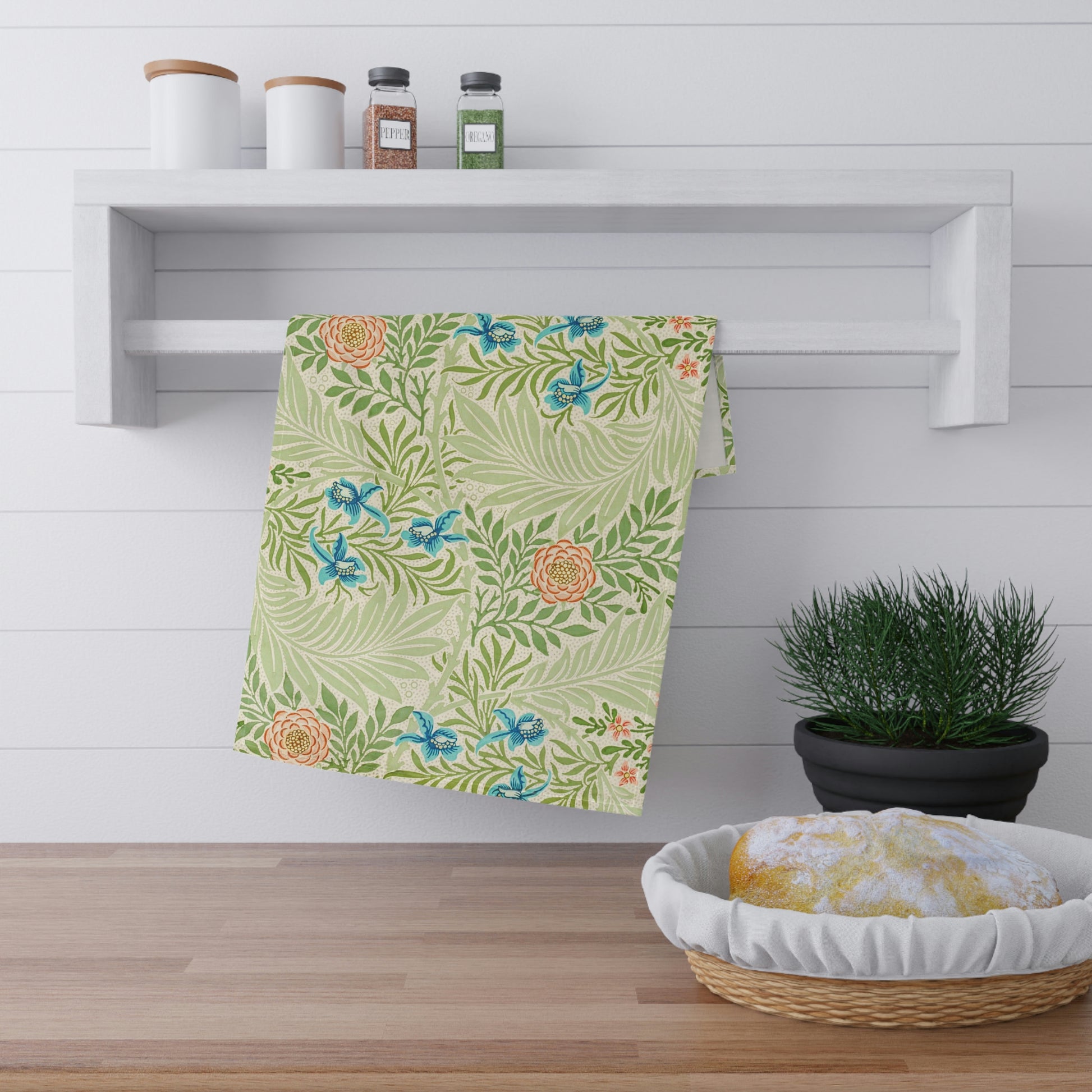A kitchen tea towel with a floral pattern inspired by William Morris - Larkspur Collection.