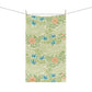A kitchen tea towel with a floral pattern inspired by William Morris - Larkspur Collection.