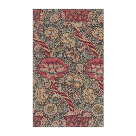 A kitchen tea towel with a red floral pattern inspired by William Morris - Wandle Collection.