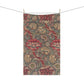 A kitchen tea towel with a red floral pattern inspired by William Morris - Wandle Collection.