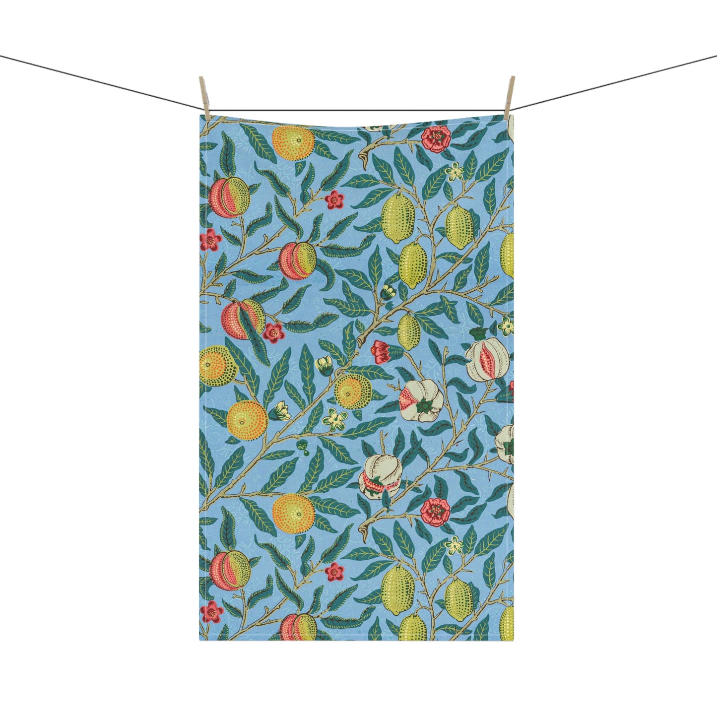 A kitchen tea towel with a blue background featuring a detailed floral and fruit pattern inspired by William Morris - Four Fruits Collection.