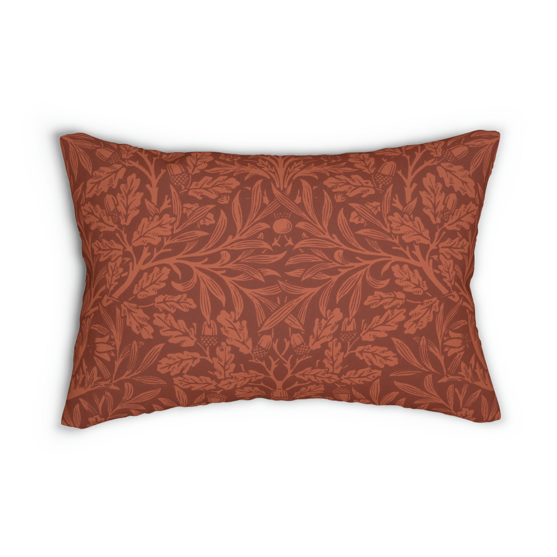 A rectangular lumbar cushion with a William Morris & CO floral pattern in a rust colour, featuring acorn and oak leaves, with a visible hidden zipper.