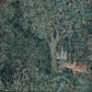 A rectangular lumbar cushion with a green and multicolour William Morris & Co floral and animal pattern design, featuring a rabbit and trees in the background.