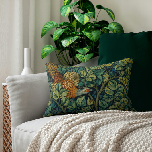 A lumbar cushion featuring a hidden beige zipper with a William Morris & Co design of a pheasant among green leaves on a background with a similar leaf pattern.