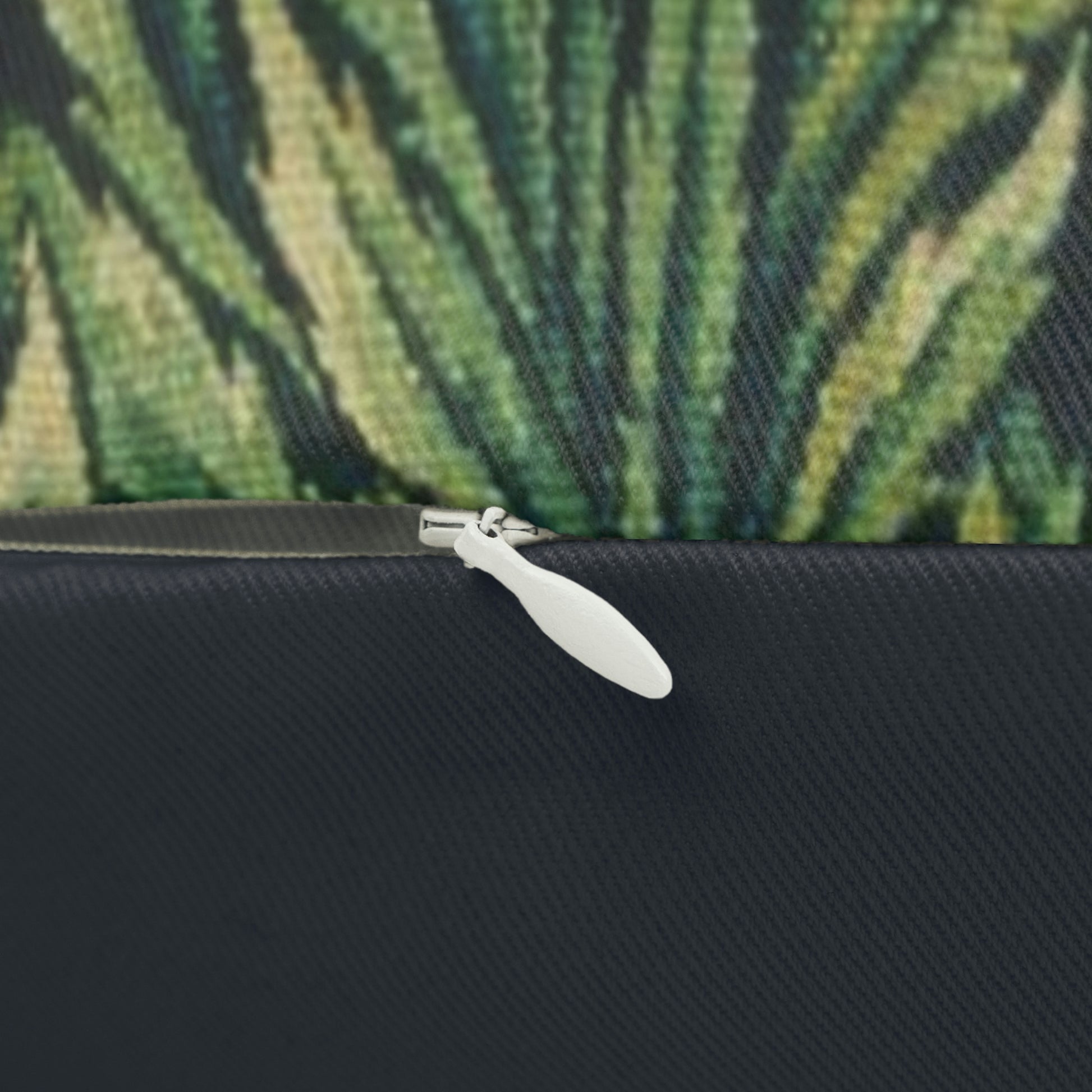 A lumbar cushion with a William Morris & Co floral and animal print design, featuring a tree and squirrel, on a white background.