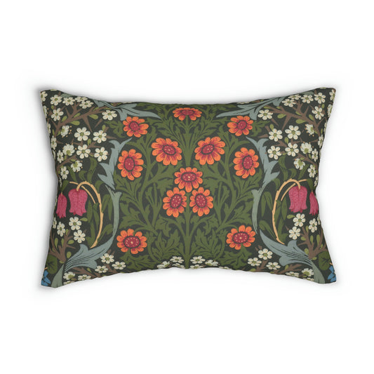 A rectangular lumbar cushion with a floral William Morris & Co pattern featuring predominantly green, with accents of red, yellow and blue.
