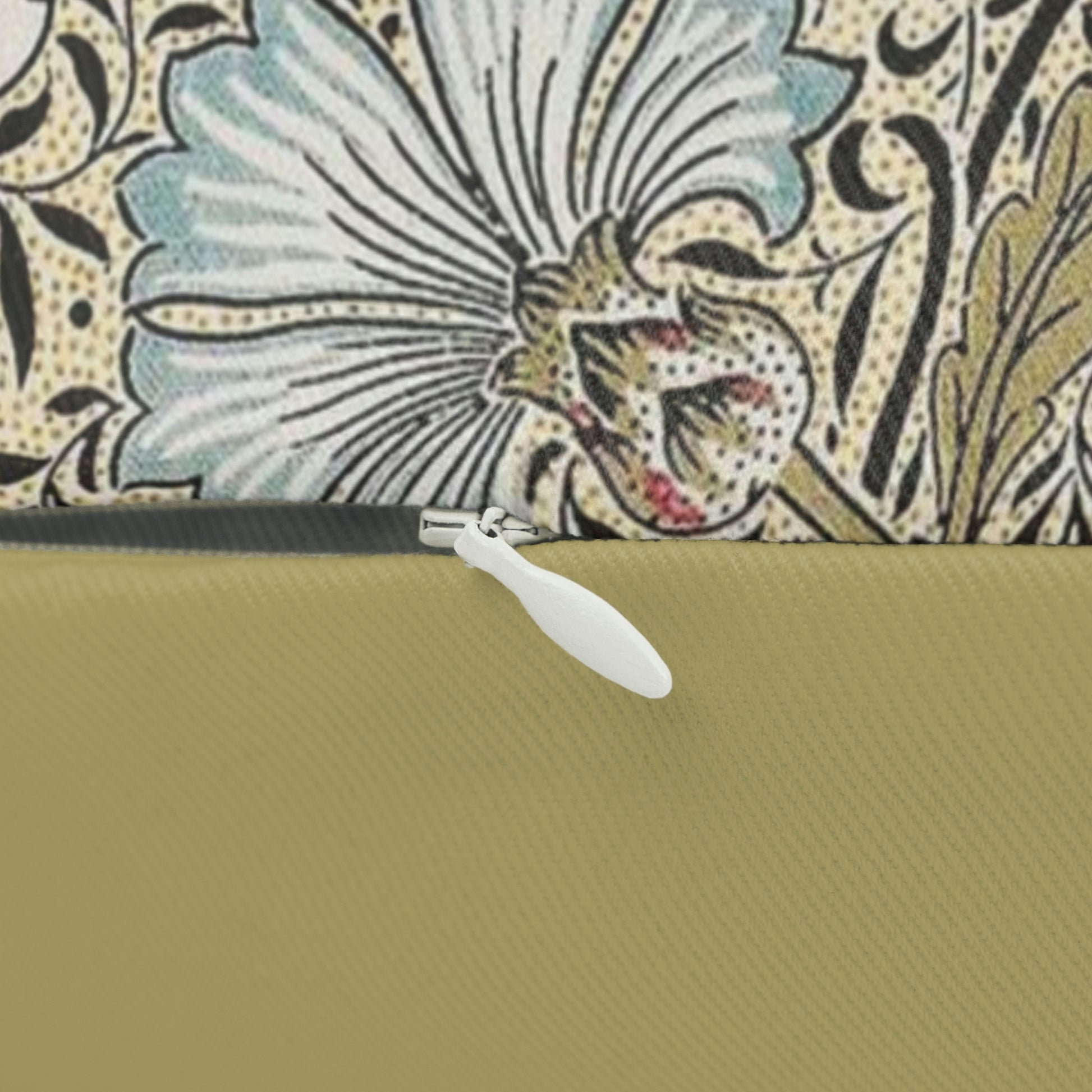 A rectangular lumbar cushion with a floral William Morris & Co pattern and a concealed zipper, in a multicolour design featuring predominantly green, beige, and pink tones.