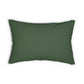 A rectangular lumbar cushion with a floral William Morris & Co pattern design in green, beige, and brown colours, featuring a concealed beige zipper.