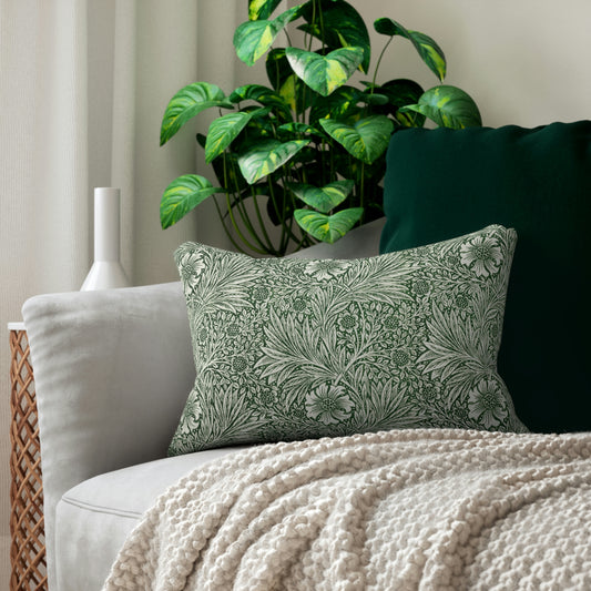 A rectangular lumbar cushion with a green William Morris & Co floral pattern on a white background, featuring a concealed beige zipper.