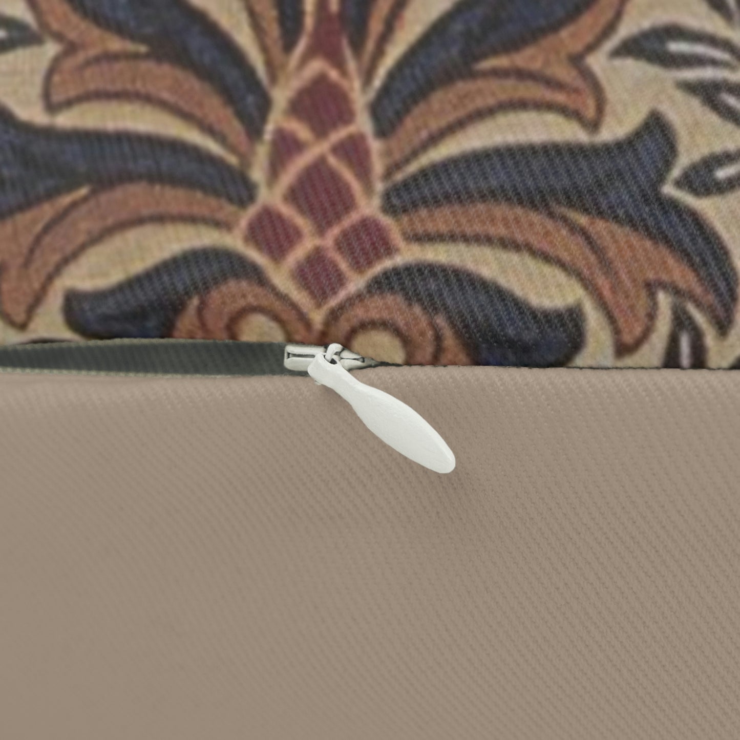 A rectangular lumbar cushion with a William Morris & Co floral pattern in a multicolour design, featuring a concealed zipper.