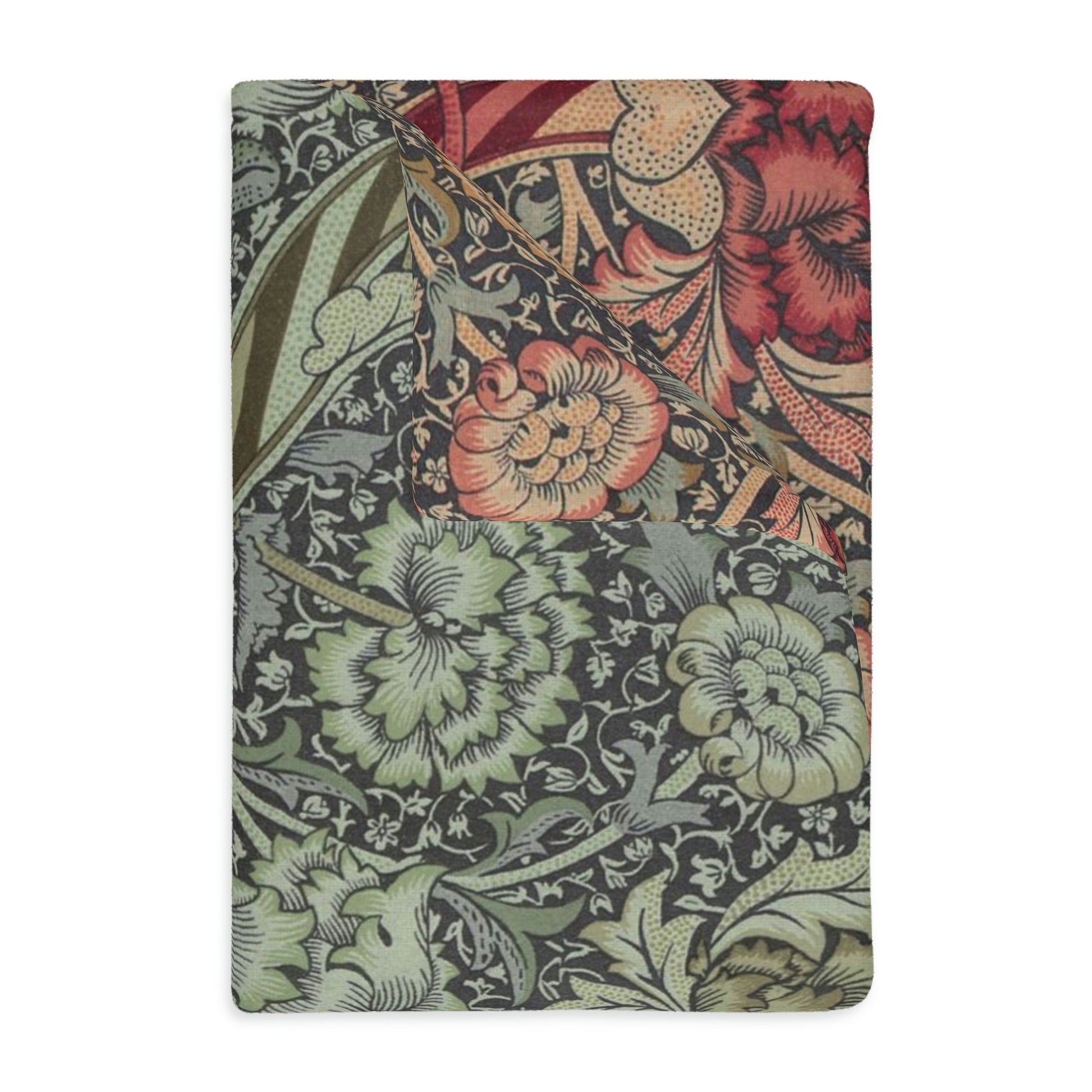 A rectangular blanket with a two-sided print featuring intricate floral designs and a minky soft velveteen texture.